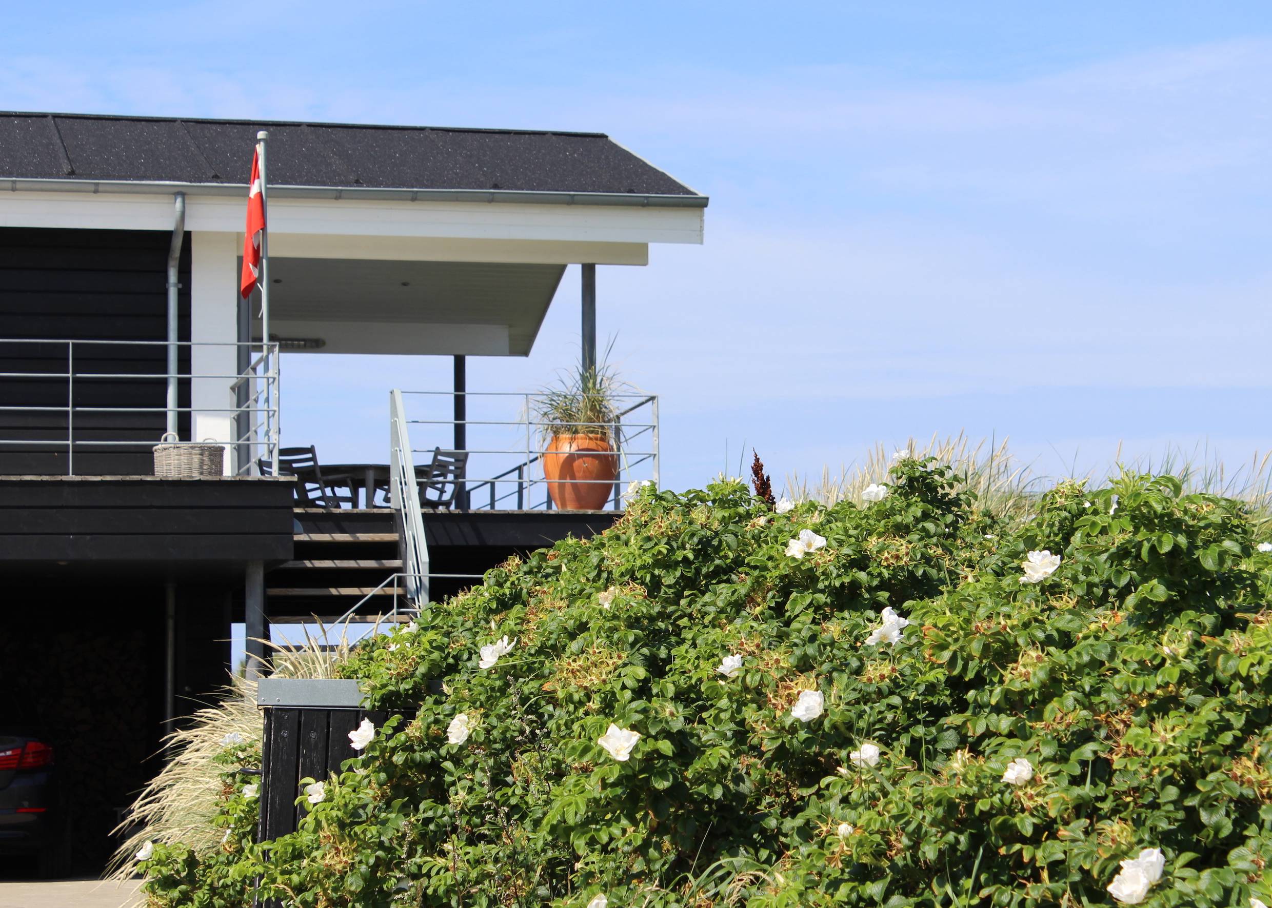 Überdachte Terrasse eines Ferienhaus in Dänemark