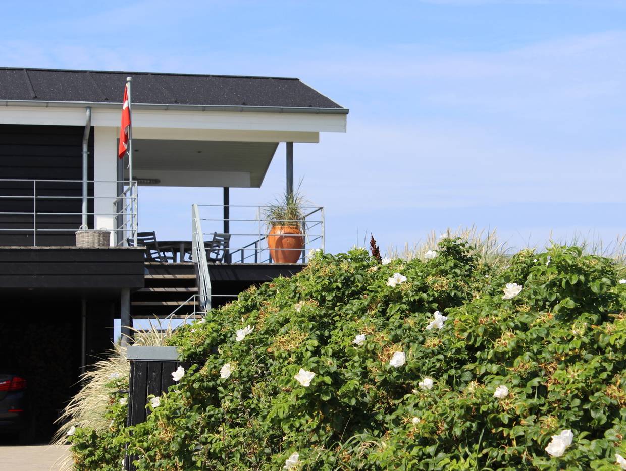 Überdachte Terrasse eines Ferienhaus in Dänemark