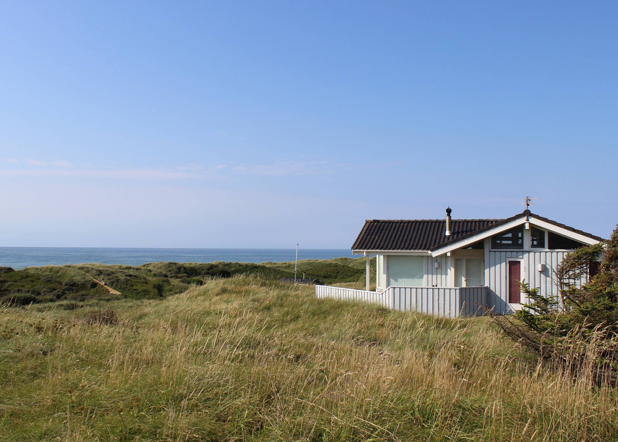 Ferienhaus auf einer Düne mit Blick auf die Nordsee in Dänemark