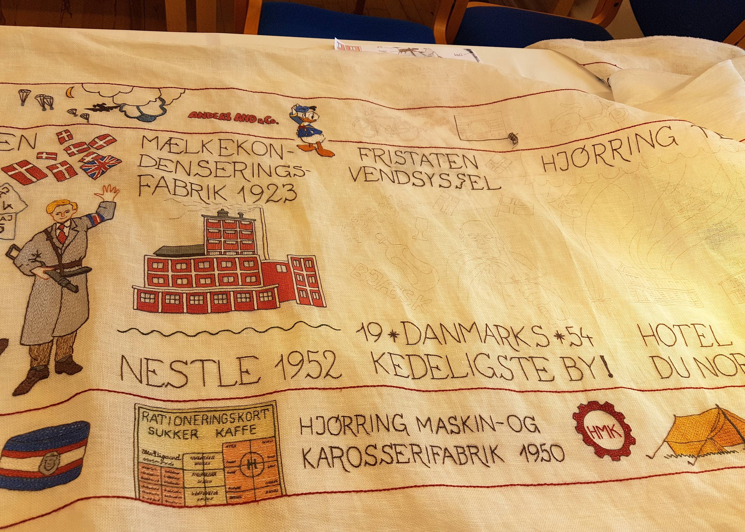 Stickerei zur Stadtgeschichte von Hjørring