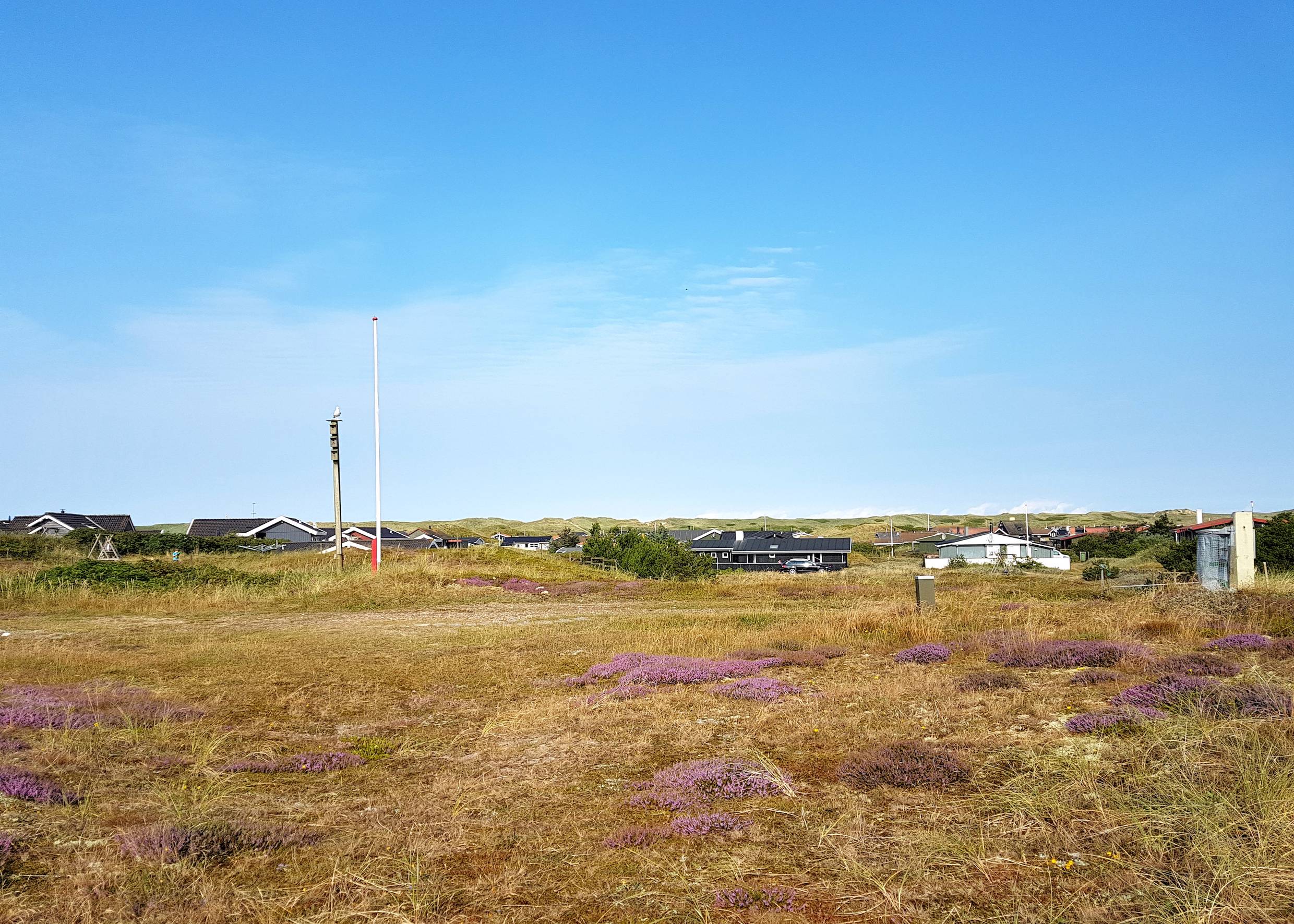 Blick über die Ferienhäuser von der Düne aus