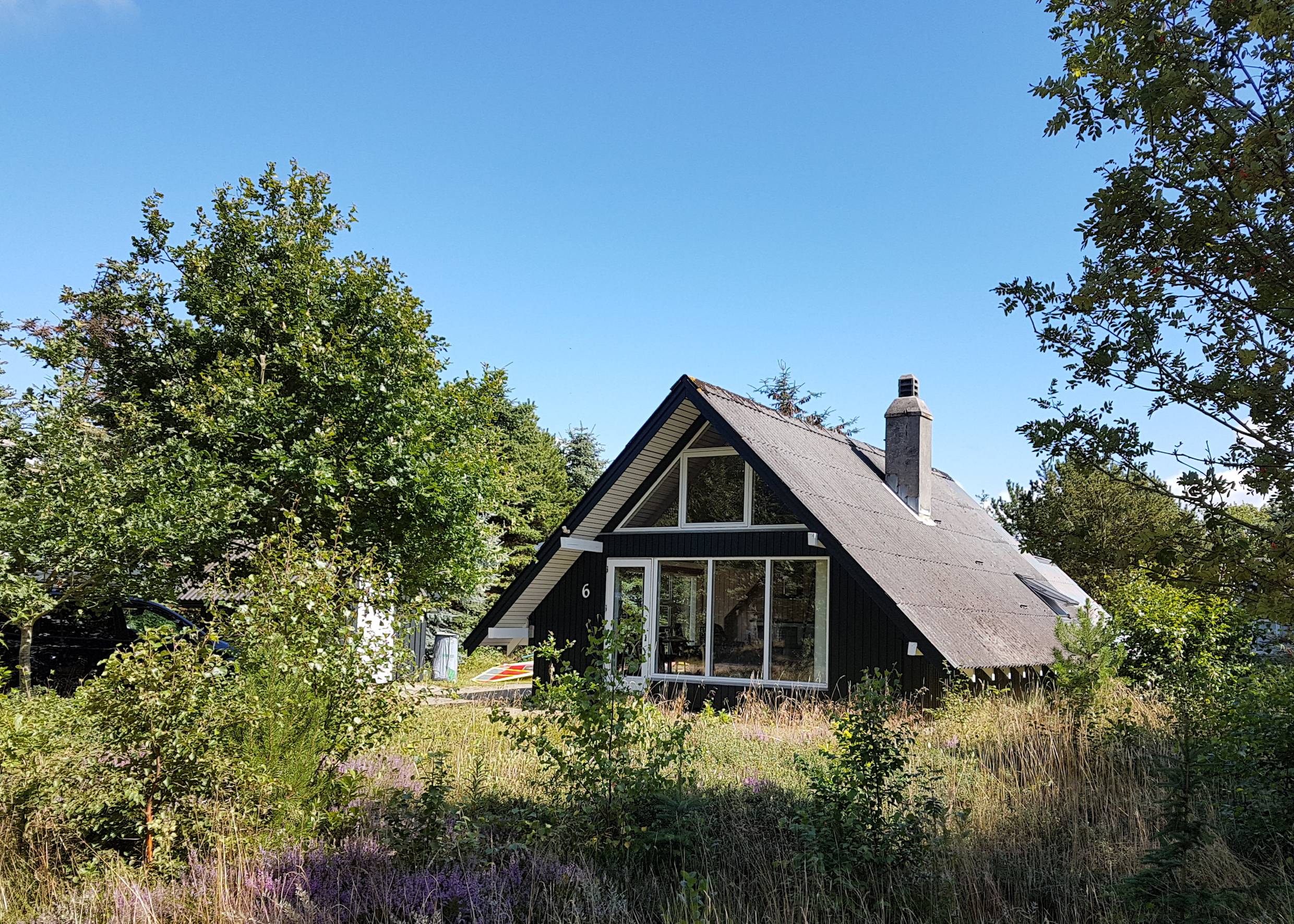 Älteres Ferienhaus im Wald