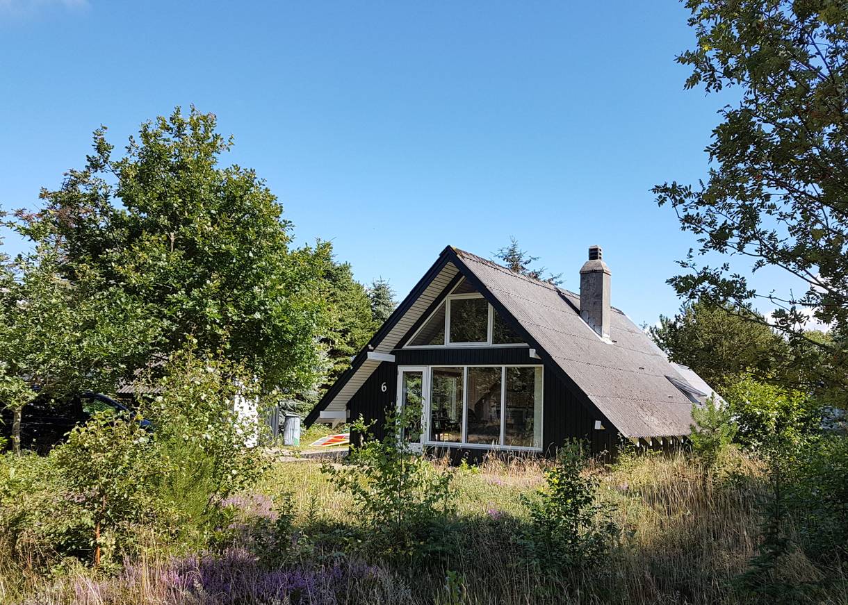 Älteres Ferienhaus im Wald