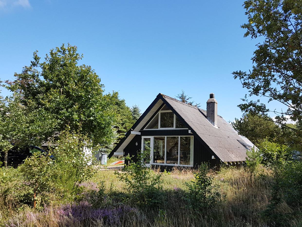 Älteres Ferienhaus im Wald